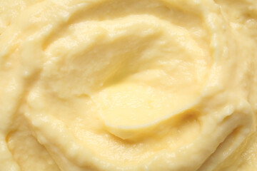 Texture of tasty vanilla pudding as background, closeup, closeup