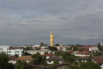 60m high gilded Buddha statue Luang Phaw Dto in Wat Burapha Phiram, Wat Burapapiram, City Panorama, Roi Et, Isan, Thailand, Asia