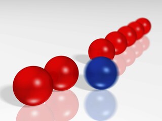 Diagonal row of shiny red glass balls, one blue ball standing apart, blurred from motion, 3-D cutout