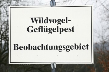 Warning sign bird flu, avian influenza surveillance area, Pinneberg, Schleswig-Holstein, Germany,...