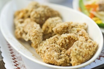 Fried chicken in white dish