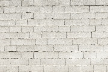 Brick-built wall of gray expanded clay stones, background image