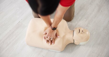 Mannequin, cpr and training with above of person for first aid workshop, cardiac arrest and safety protocol. Healthcare class, medical simulation and heart attack rescue with paramedic course