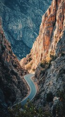 Winding road through a dramatic mountain gorge.