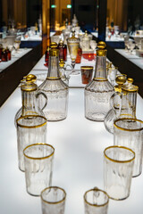 Lot consisting of historical glasses and bottles made of cut chalk glass, painted and gilded. Bavarian National Museum