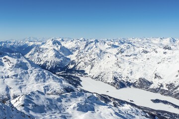View of Lake Sils from Corvatsch, mountains in winter, Swiss Alps, Engadin, Canton of Graubünden, Switzerland, Europe