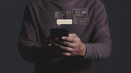 Excellence Review, Young Man hand holding Smart Phone with five star to review and give 5 stars with very good results in service, Good review 5 star rating choice feedback