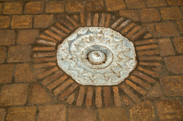 Marble decorated rain gutter grate from the ancient city of Khiva in Uzbekistan