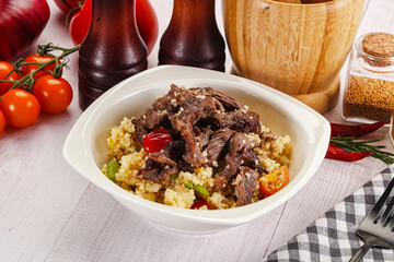 Traditional couscous with beef and vegetables