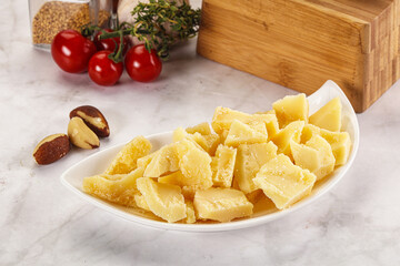 Crushed parmesan cheese in the bowl