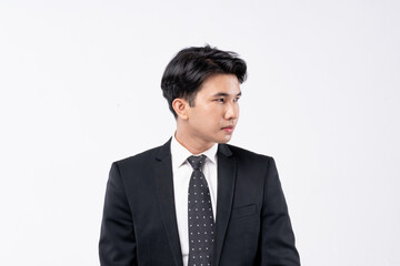 A man in a suit and tie is smiling for the camera