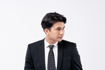 A man in a suit and tie is smiling for the camera