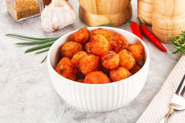 Baked young potato with paprika