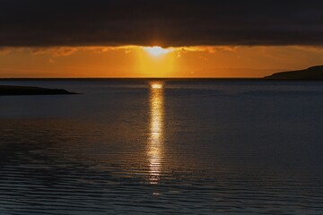 Fototapeta premium Sunset, sun reflected in the water, near Grundarfjördur, peninsula Snaefellsnes, Iceland, Europe