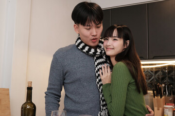 Young Asian couple living at home