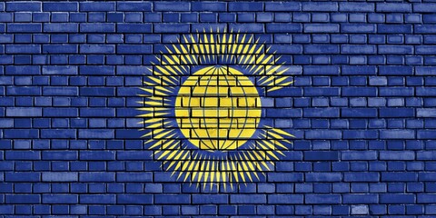 Flag of Commonwealth of Nations painted on brick wall