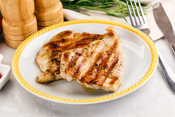 Grilled pork steak with sauce