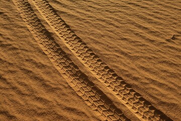 Vehicle tracks on a sand dune, Tassili n'Ajjer National Park, UNESCO World Heritage Site, Sahara desert, Algeria, Africa