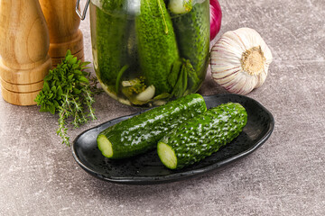 Homemade lighty salted cucumbers with herbs