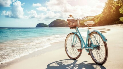 Fototapeta premium Bicycle on a white sand beach with a tropical island in the background.