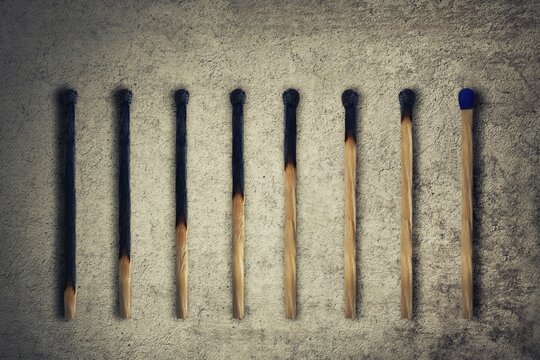 Set of burnt match at different stages, as a financial chart or graph showing business growth. Leadership concept