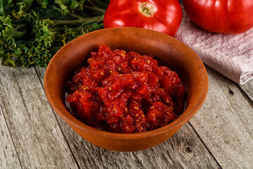 Diced ripe tomato with sauce