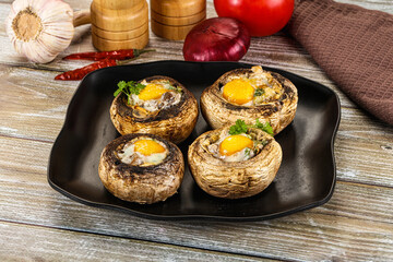 Baked champignon with quail egg