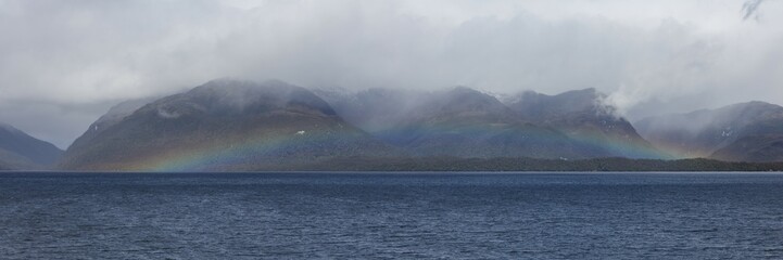 Patagonia's fjord region with a large rainbow, Calbuco, Region de los Lagos, Chile, South America
