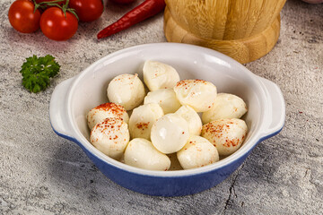 Mozzarella balls cheese in the bowl