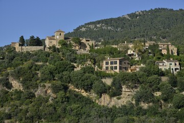 Obraz premium The village of Deià, Serra de Tramuntana, Majorca, Balearic Islands, Spain, Europe
