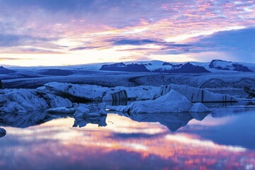 Icebergs in the glacier lagoon Jökulsarlon at sunset, South Iceland, Iceland, Europe