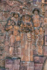 Close-up of figures from communist era on façade of city market, Kutaisi, Imereti Region, Georgia, Asia