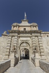 Historic city gate with bridge, Mdina, Malta, Europe