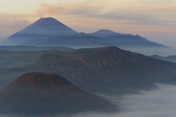 Sunrise over the smoking Gunung Bromo volcano, Bromo-Tengger-Semeru National Park, Java, Indonesia,...