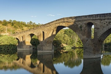 Fototapeta premium Romanesque bridge over Arga river, Puente La Reina, Navarre, Spain, Europe