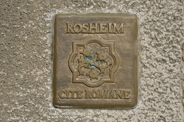 Rosheim Cité novels sign on a wall in the historic centre of Rosheim, Bas-Rhin, Alsace, France, Europe
