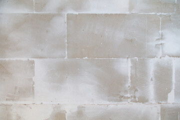 A wall with a white paint splatter on it