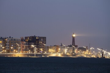 Beach promenade with lighthouse, Scheveningen, The Hague, Holland, The Netherlands, Europe
