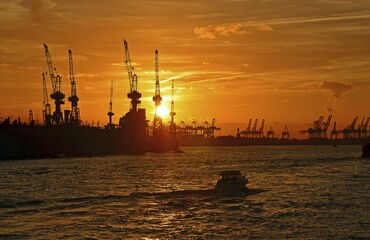 Sunset, silhouette, Hamburg harbour with harbour cranes, Hamburg, Germany, Europe