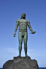 Fototapeta premium Mencey Statue on the Candelaria Promenade, Statue of Guanchen King Romen, Tenerife, Canary Islands, Spain, Europe