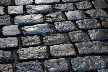 Wet cobblestones in Flensburg, Schleswig-Holstein, Germany, Europe