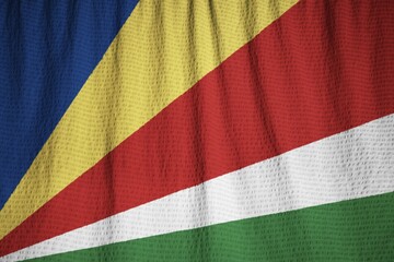 Closeup of Ruffled Seychelles Flag, Seychelles Flag Blowing in Wind