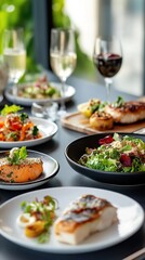 Gourmet meal served with wine at restaurant table.
