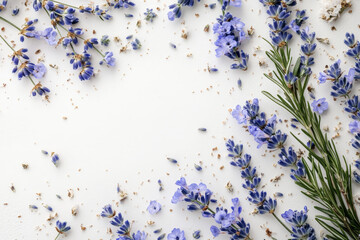 Obraz premium Fresh sprigs of lavender and scattered petals arranged on a clean white surface, evoking a serene and fragrant mood.
