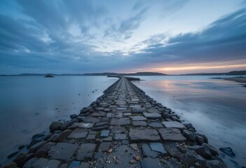 A beautiful cove with crystal clear blue water and sandy beaches surrounded by cliffs and greenery.