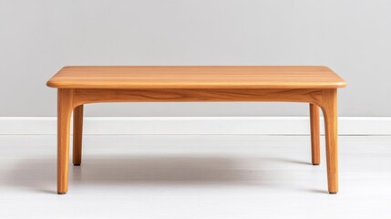 Polished teak coffee table with a slimline rectangular design
