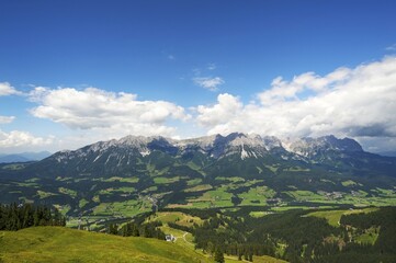 Fototapeta premium View from Brandstadl cable car towards town and Wilder Kaiser, Scheffau am Wilden Kaiser, Tyrol, Austria, Europe