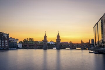 Oberbaum bridge between Kreuzberg and Friedrichshain at sunset, Spree, Berlin, Germany, Europe