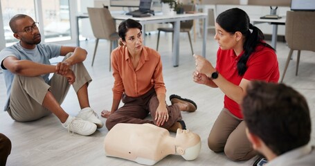 People, mannequin or first aid in office for learning, CPR workshop or safety demonstration. Design...