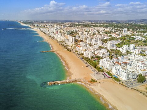 Aerial view, wide sandy beach in touristic resorts of Quarteira and Vilamoura, Algarve, Portugal, Europe